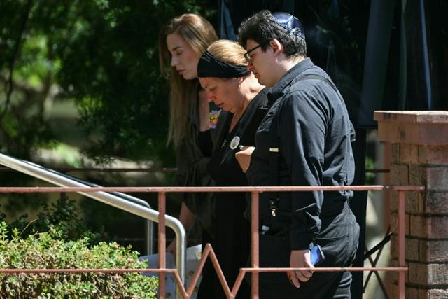 Attentat de Sydney: l'Australie enterre une victime de 10 ans et promet de sévir contre l'extrémisme