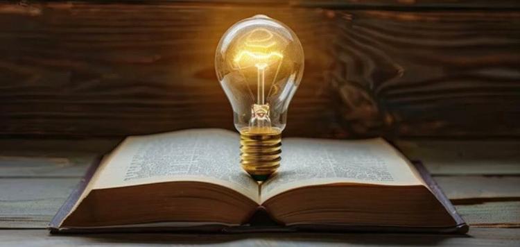 Ampoule sur un livre